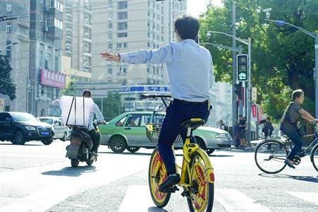 降低事故發生 上海推廣共享單車手語