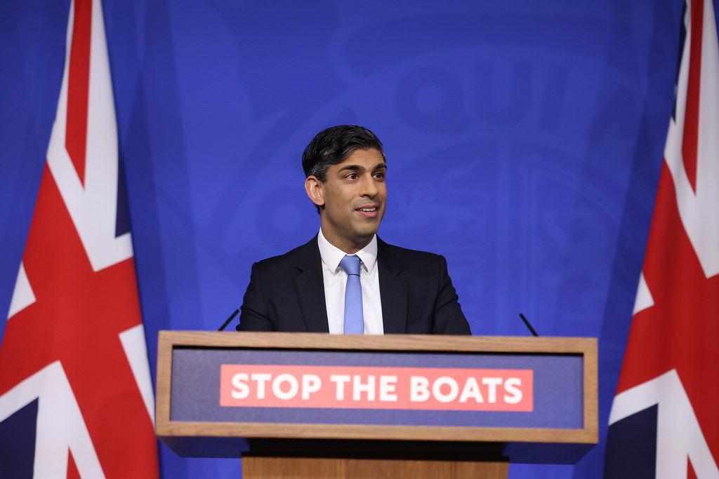 英首相力阻同志倒戈 通過盧安達法案
