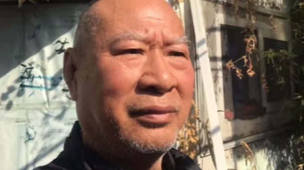異議人士朱虞夫抵達日本接受癌症治療